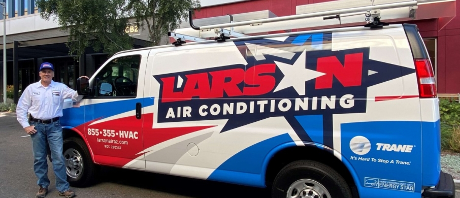 Larson employee with Larson van